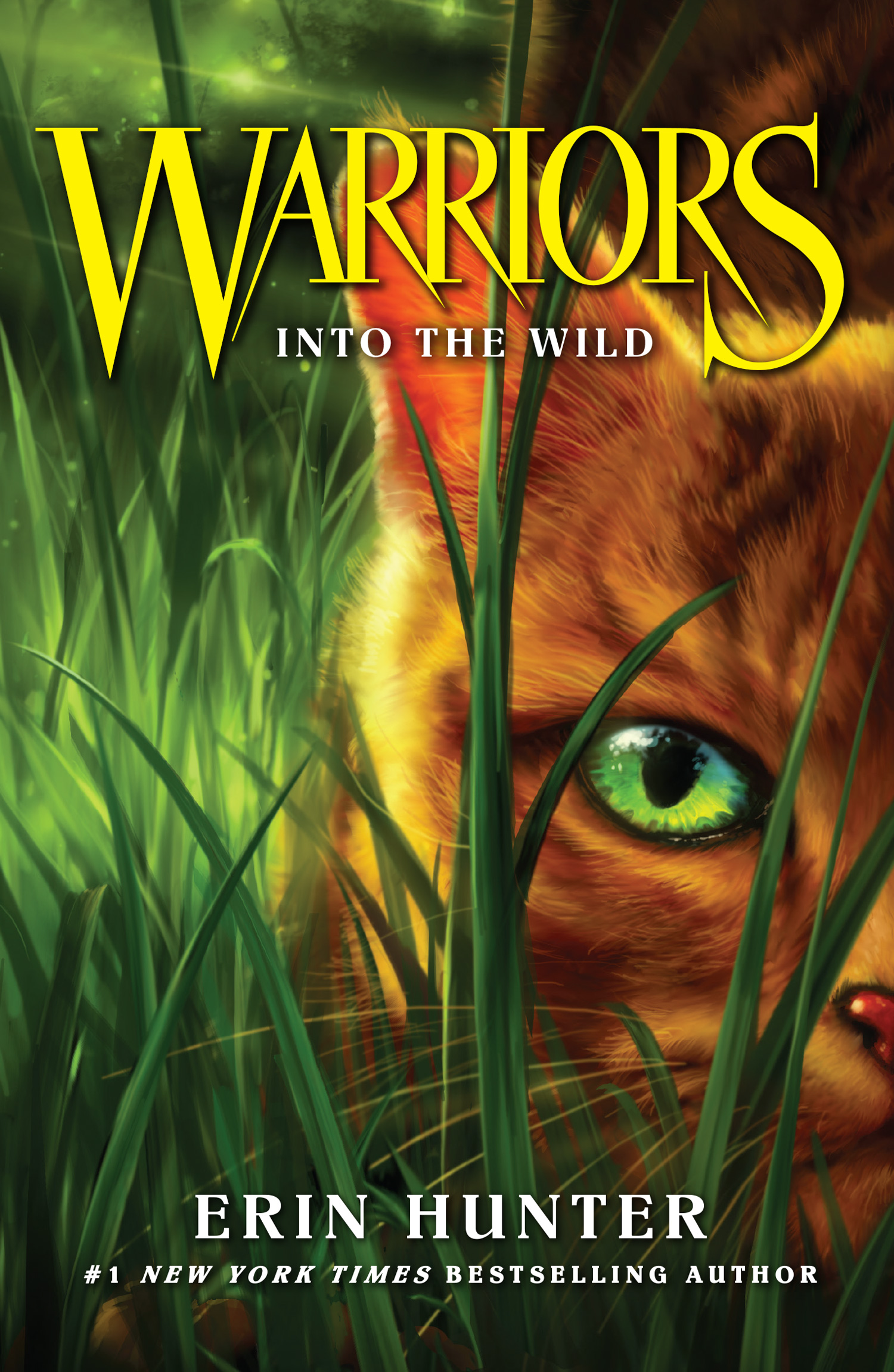 The cover of "Warriors: Into the Wild" features a close-up of a yellow-eyed cat peering through lush green grass, with the title prominently displayed in bold yellow lettering. The author's name, Erin Hunter, is featured at the bottom.